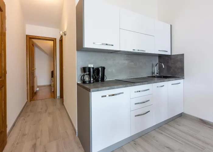 Sunshine E Апартаменты